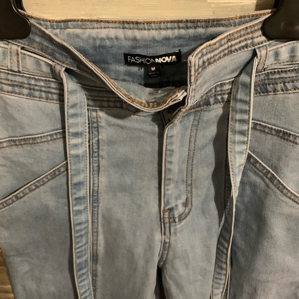 Fashion Nova Blue Denim with belt Flared Jeans